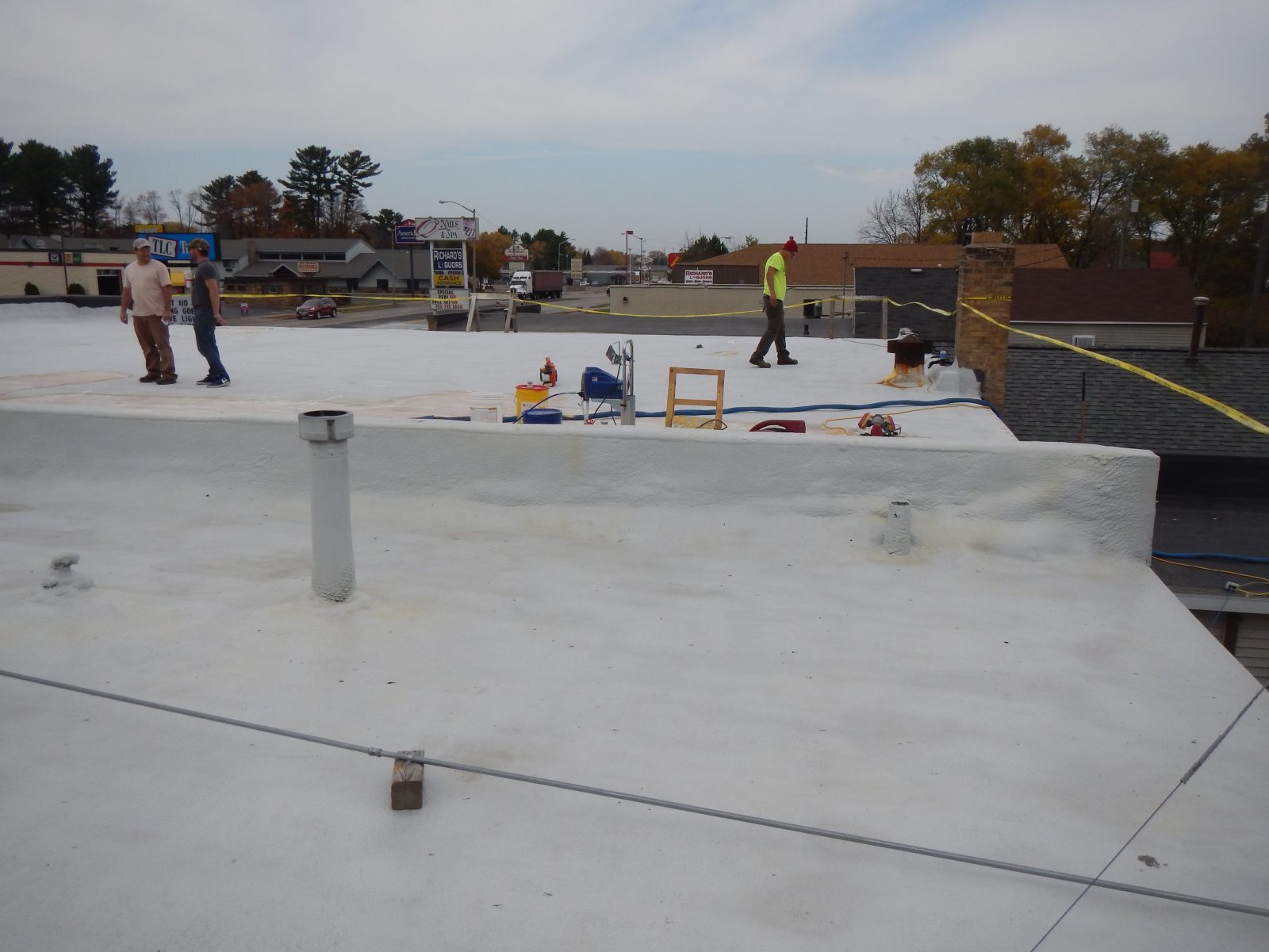 Rounded metal mobile home roof prepared for coating